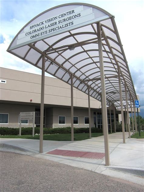 metal canopy fabricators|prefab metal walkway canopies.